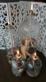 Glazen olielampen (set van vier), Ophalen