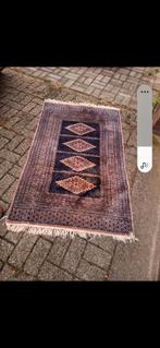 Perzische hand werk tapijt  100 cm lang 60 cm breed, Ophalen of Verzenden, Gebruikt
