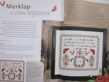 Borduur telpatroon merklap in warme herfstkleuren beschikbaar voor biedingen