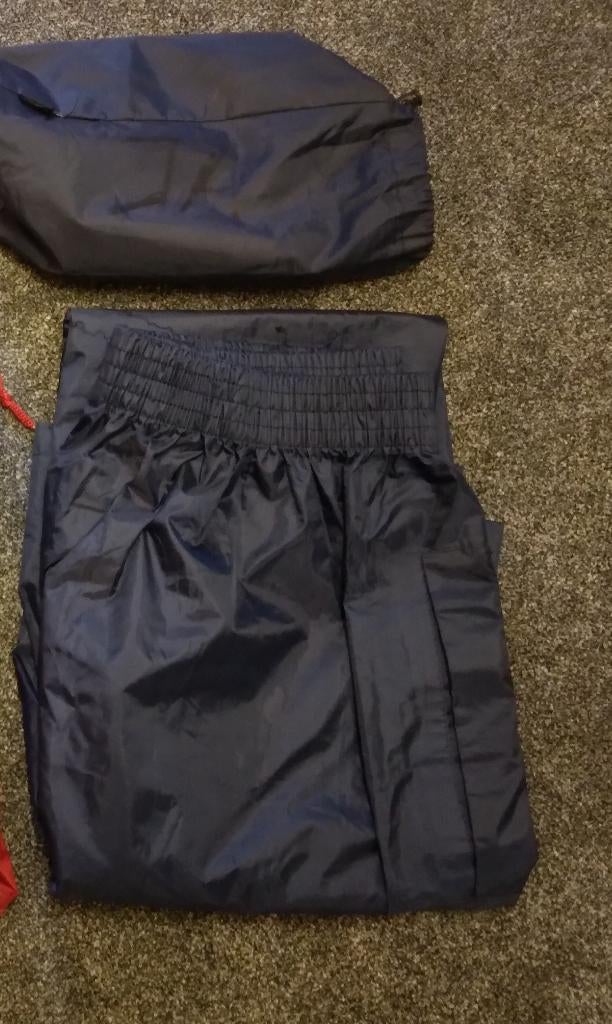 Blauwe regenbroek maat S/M * lengte 115 cm. Nieuwstaat, Ophalen of Verzenden, Nieuw, Regenbroek, Heren