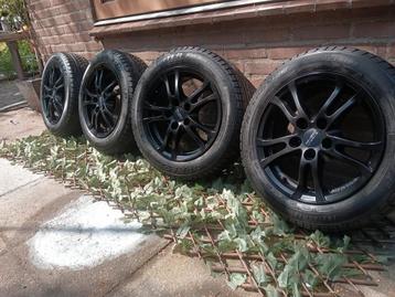 5x100 wielen met DUNLOP 185/60 R15 nieuwstaat beschikbaar voor biedingen