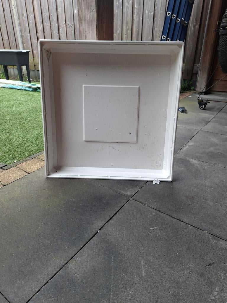 Lekbak wasmachine, Ophalen