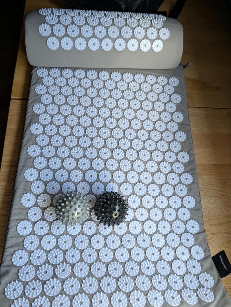 Spijker mat met lussen en ballen, Ophalen