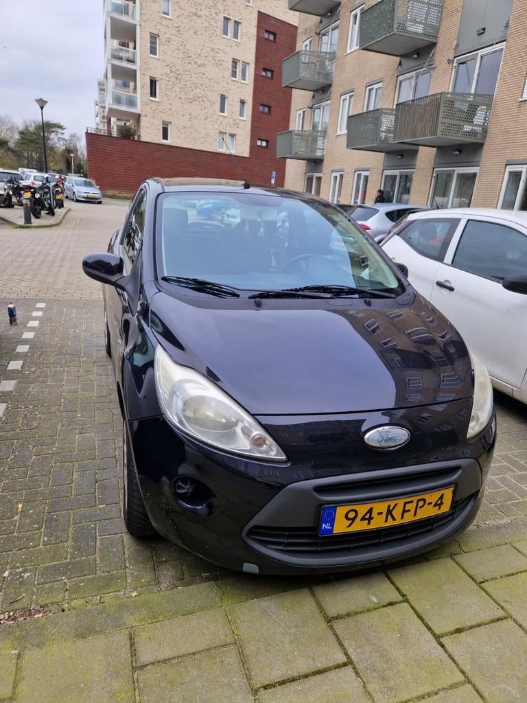 Ford Ka 1.2 51KW 2009 Zwart, Auto's, Ford, Voorwielaandrijving, Stof, Airbags, 4 cilinders