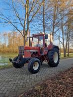 International 845xl met fronthef en 2M grondbak, Ophalen, 80 tot 120 Pk, Gebruikt, Meer dan 10000