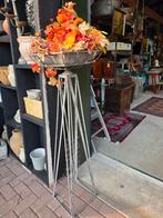 Ijzeren plantenstandaard, Ophalen