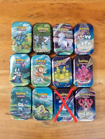 Pokémon kaarten / kaartjes tin pakketjes beschikbaar voor biedingen
