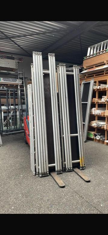 Gebruikte aluminium rolsteiger beschikbaar voor biedingen