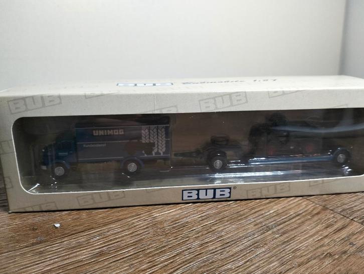 Te koop BUB Mercedes L911 met dieplader/Umimog gelimiteerd., Hobby en Vrije tijd, Modelauto's | 1:87, Zo goed als nieuw, Bus of Vrachtwagen