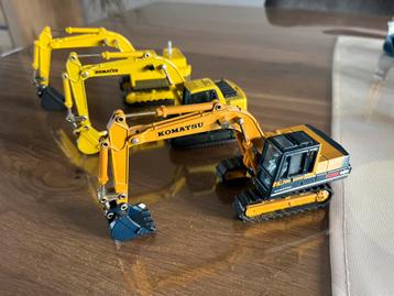 Drie Komatsu rupskranen PC 100 en HT 12 beschikbaar voor biedingen
