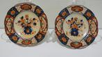 Paar antieke Japanse imari-borden [1769], Ophalen