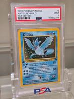 PSA 9 - Articuno Holo 1st Edition #2 (2000 Pokemon Fossil), Hobby en Vrije tijd, Verzamelkaartspellen | Pokémon, Ophalen of Verzenden