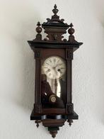 Antieke houten staartklok, Ophalen