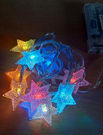 Leuke gekleurde sterren Kerstverlichting op batterijen beschikbaar voor biedingen