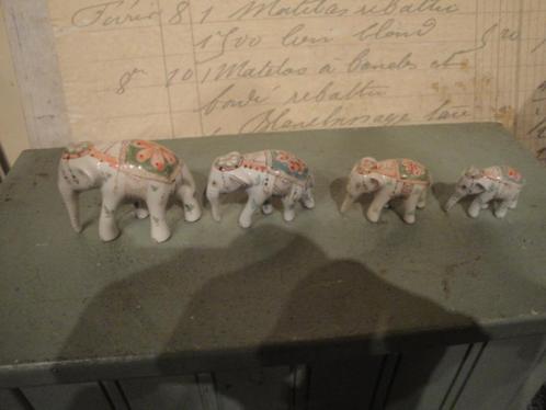 mini olifantjes apart motief 4 stuks porcelijn, Antiek en Kunst, Curiosa en Brocante, Ophalen of Verzenden