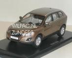 Volvo. XC60 terra brons metall. Motor. Art 1:43 .-L spiegel., Hobby en Vrije tijd, Modelauto's | 1:43, Ophalen of Verzenden, Zo goed als nieuw