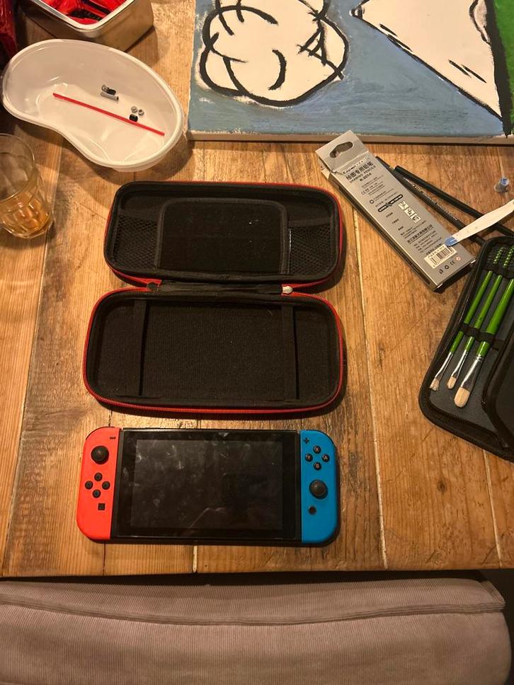 Nintendo Switch + Hoesje, Spelcomputers en Games, Games | Nintendo Switch, Gebruikt, Avontuur en Actie, 1 speler, Vanaf 7 jaar