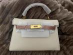 Elegante tas met dustbag en lange strap nieuw!, Verzenden, Nieuw, Wit, Handtas