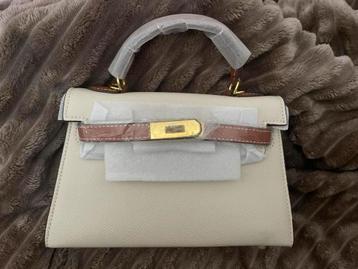 Elegante tas met dustbag en lange strap nieuw! beschikbaar voor biedingen