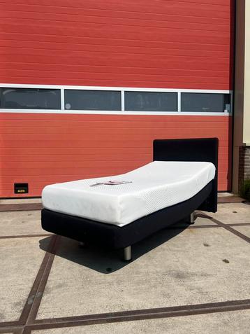 Elektrisch Tempur bed, massagefunctie en afstandsbediening beschikbaar voor biedingen