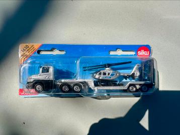 Siku 1610 oplegger met polizei helikopter beschikbaar voor biedingen