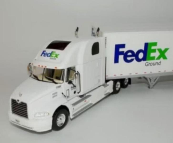 MACK VISION 2000 FEDEX schaal 1/43 serie USA TRUCKS # 50, Hobby en Vrije tijd, Modelauto's | 1:43, Nieuw, Bus of Vrachtwagen, Overige merken