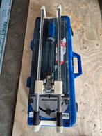 Te koop goede tegelsnijder met gebruikt mesje en nieuw mesje, Gebruikt, Ophalen of Verzenden, 10 m² of meer, Overige materialen