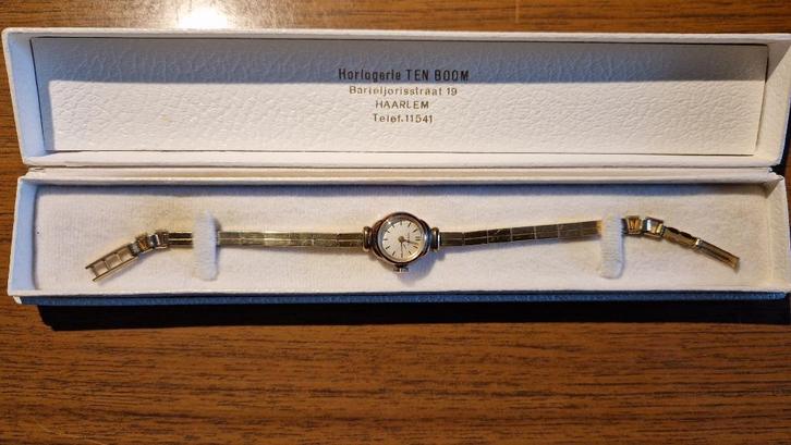 Goudkleurig dames horloge (uit 1960), Sieraden, Tassen en Uiterlijk, Horloges | Dames, Gebruikt, Polshorloge, Overige merken, Overige materialen