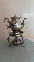 Mooi theepotje met rechaud, Ophalen