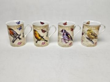 # 4 koffie of thee mokjes met vogels en vlinders. Stampes? beschikbaar voor biedingen