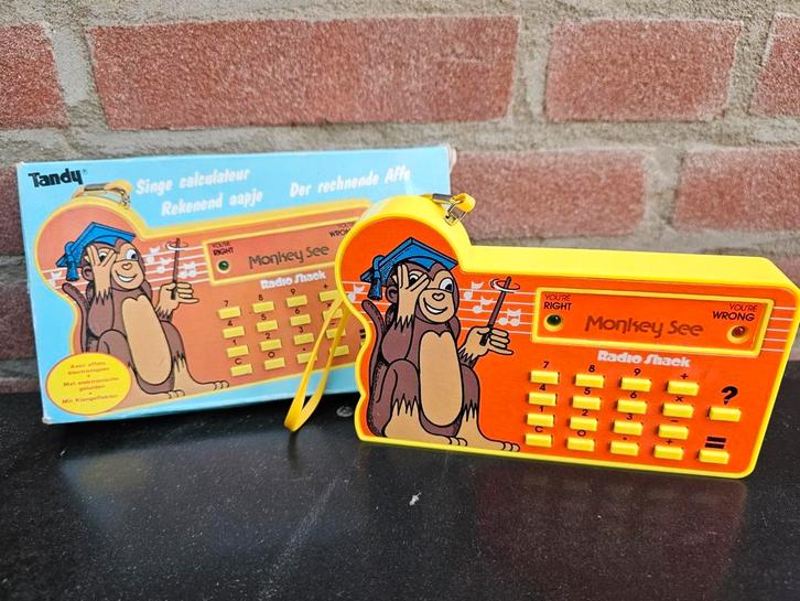 Tandy Monkey See Radio Shack - vintage speelgoed calculator, Antiek en Kunst, Antiek | Speelgoed, Ophalen of Verzenden
