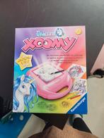 Xoomy eenhoorns, Hobby en Vrije tijd, Tekenen, Ophalen of Verzenden, Zo goed als nieuw, Boek of Gids