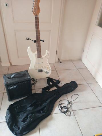 Ritmüller electr. gitaar incl. standaard, hoes en versterker beschikbaar voor biedingen