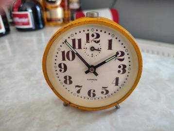 Leuke antieke, vintage, retro brocante Lumen wekker beschikbaar voor biedingen