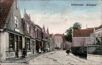 Dirksland Winterstraat winkels en volk  st 1910 Prachtkaart beschikbaar voor biedingen