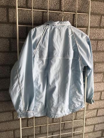 Leuk lichtblauw trainingsjack beschikbaar voor biedingen
