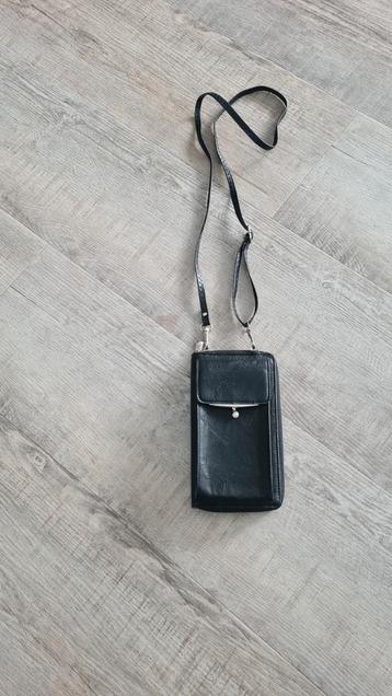 Nieuw zwart telefoontasje met parel beschikbaar voor biedingen