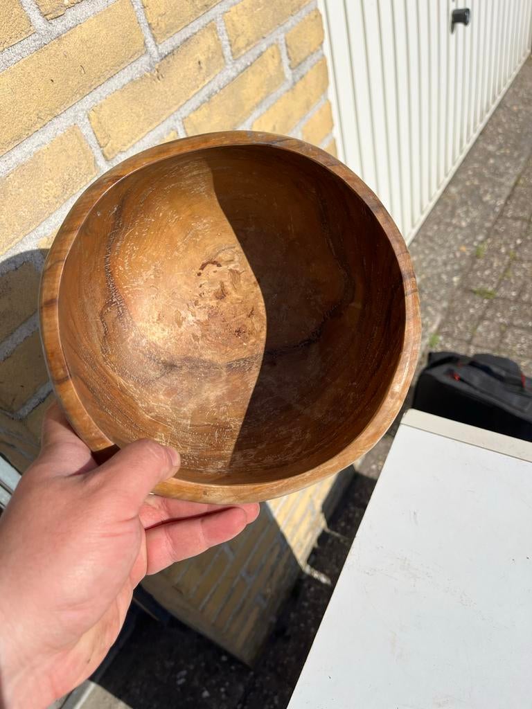 Olijfhouten kom, Ophalen