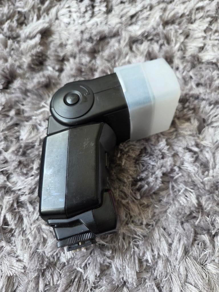 Metz Mecablitz 44 AF-4C flitser voor Canon, Ophalen of Verzenden, Zo goed als nieuw, Metz, Kantelbaar