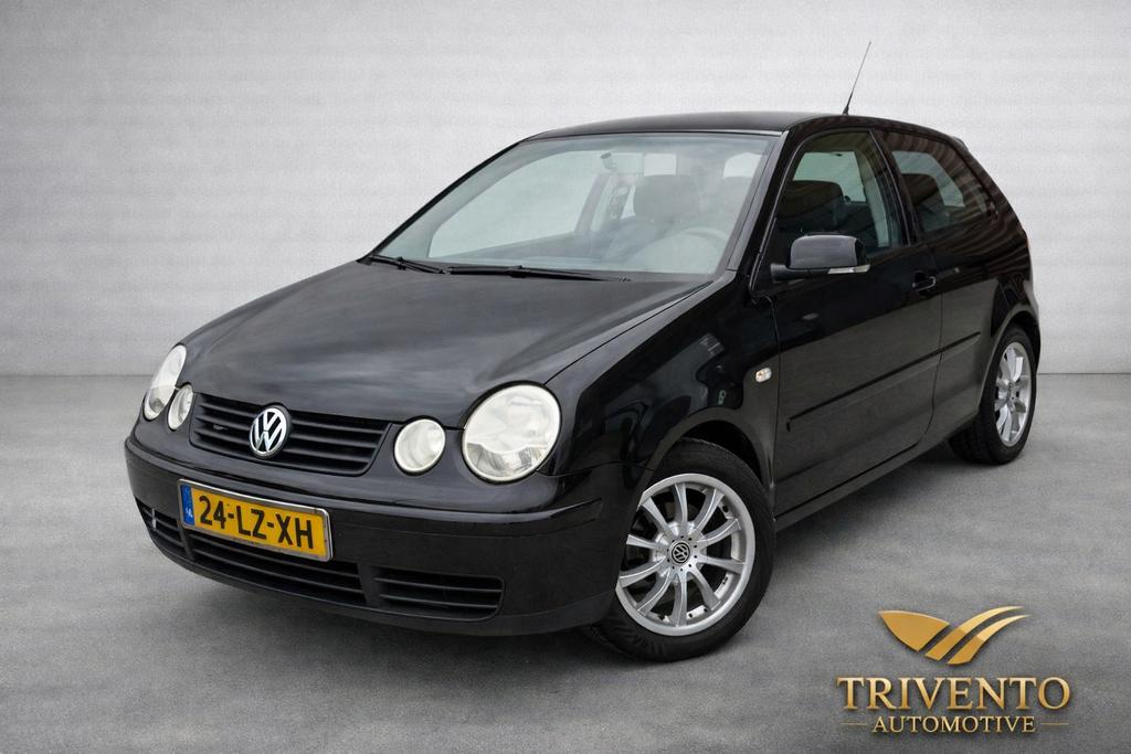 Volkswagen Polo 1.4 55KW 2003 Zwart, Auto's, Voorwielaandrijving, Stof, Huisgarantie, Met garantie (alle)