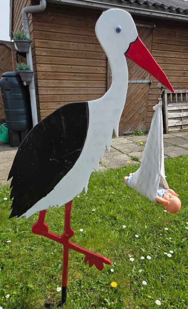 Ooievaar met pop, Ophalen