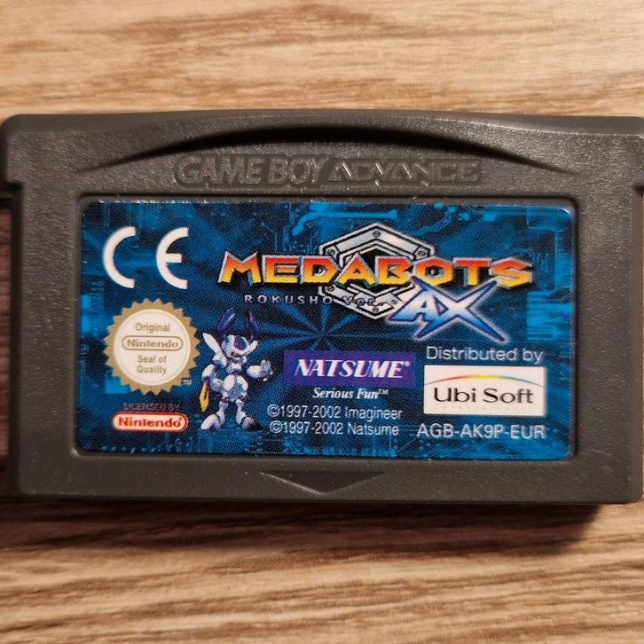 Medabots AX Rokusho version gameboy advance, Spelcomputers en Games, Games | Nintendo Game Boy, Zo goed als nieuw, Avontuur en Actie