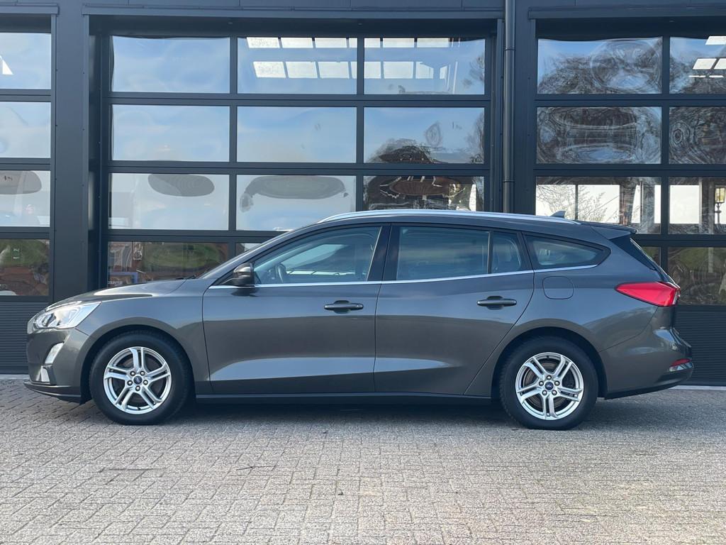 Ford Focus Wagon 1.0 EcoBoost Titanium Business, Auto's, Gebruikt, Euro 6, 715 kg, 1331 kg