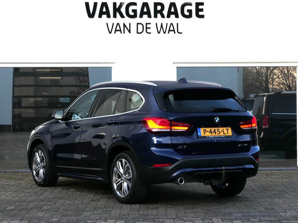BMW X1 sDrive18i High Executive | Orange edition | Trekhaak, Auto's, BMW, Gebruikt, Euro 6, Blauw, 19 km/l