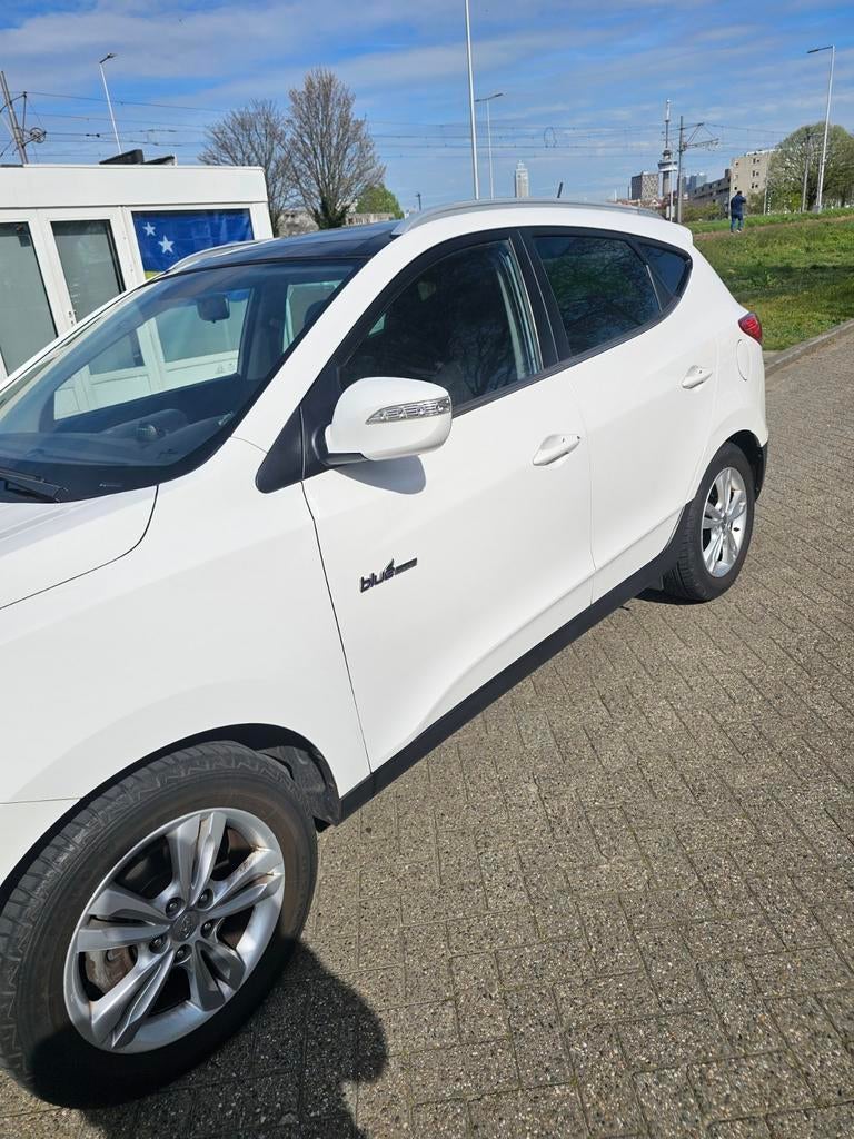 Hyundai iX35 1.6i GDI Blue 135pk 2012 Wit, Voorwielaandrijving, 1280 kg, 1591 cc, 4 cilinders