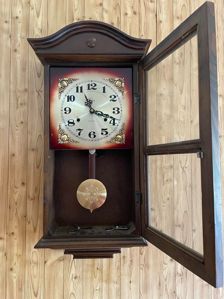 Antieke wandklok met slinger - rechter opwindmechanis, Ophalen