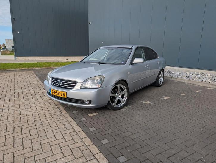Kia Magentis 2.7 V6 AUT 2006 Grijs, Auto's, Kia, Particulier, Magentis, ABS, Achteruitrijcamera, Airbags, Airconditioning, Android Auto