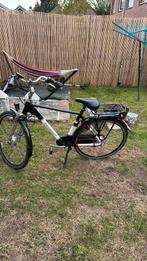 Peugeot elektrische fiets.voorwielaandrijving. Zonder accu, Minder dan 30 km per accu, Gebruikt, 55 tot 59 cm, Ophalen