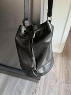 cowboysbag tas, Ophalen