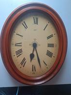 Te koop ovaal notenhout klok, Ophalen of Verzenden